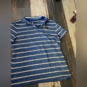 blue and white dri-fit nike collared shirt
